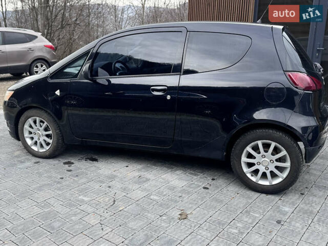 Чорний Міцубісі Кольт, об'ємом двигуна 1.33 л та пробігом 149 тис. км за 4850 $, фото 8 на Automoto.ua