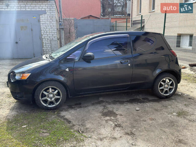 Черный Мицубиси Кольт, объемом двигателя 1.33 л и пробегом 130 тыс. км за 5700 $, фото 10 на Automoto.ua