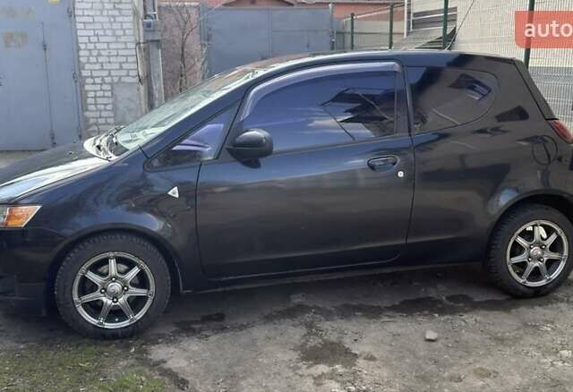 Чорний Міцубісі Кольт, об'ємом двигуна 1.3 л та пробігом 110 тис. км за 5900 $, фото 4 на Automoto.ua