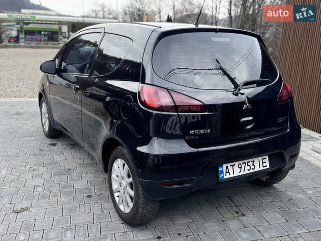 Чорний Міцубісі Кольт, об'ємом двигуна 1.33 л та пробігом 149 тис. км за 4850 $, фото 7 на Automoto.ua