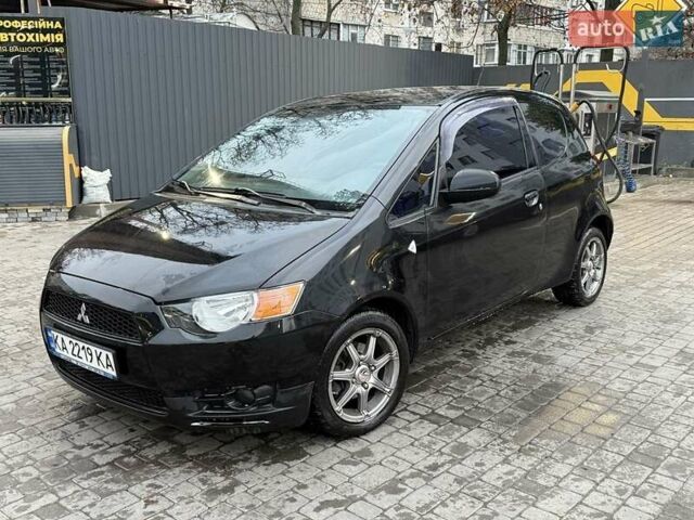 Чорний Міцубісі Кольт, об'ємом двигуна 1.3 л та пробігом 110 тис. км за 5900 $, фото 6 на Automoto.ua