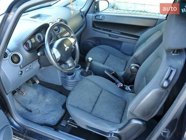 Черный Мицубиси Кольт, объемом двигателя 1.12 л и пробегом 251 тыс. км за 3800 $, фото 13 на Automoto.ua