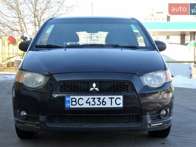 Черный Мицубиси Кольт, объемом двигателя 1.12 л и пробегом 251 тыс. км за 3800 $, фото 3 на Automoto.ua