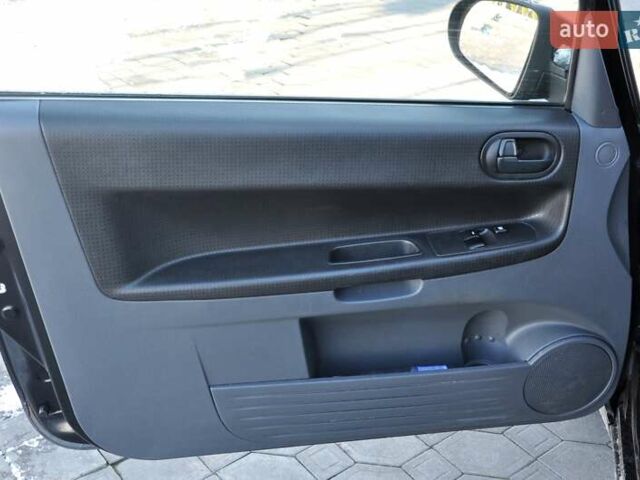 Черный Мицубиси Кольт, объемом двигателя 1.12 л и пробегом 251 тыс. км за 3800 $, фото 12 на Automoto.ua