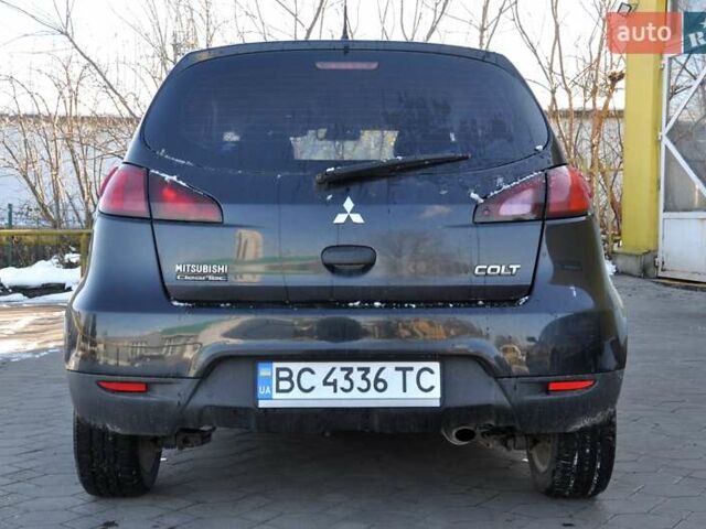 Черный Мицубиси Кольт, объемом двигателя 1.12 л и пробегом 251 тыс. км за 3800 $, фото 9 на Automoto.ua