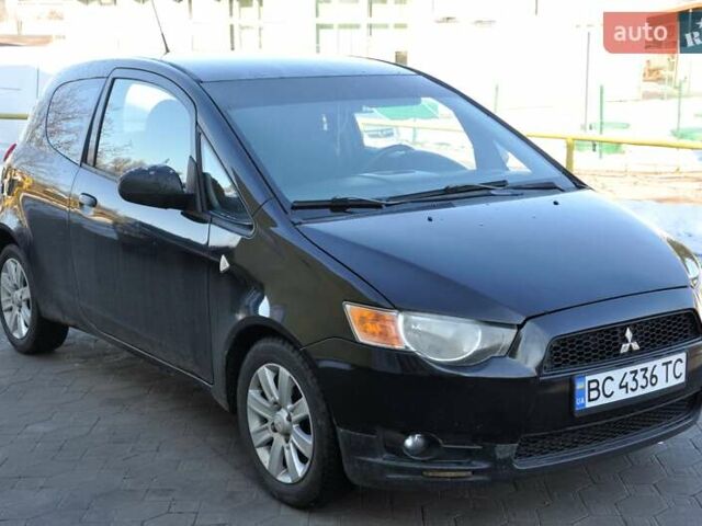 Черный Мицубиси Кольт, объемом двигателя 1.12 л и пробегом 251 тыс. км за 3800 $, фото 4 на Automoto.ua