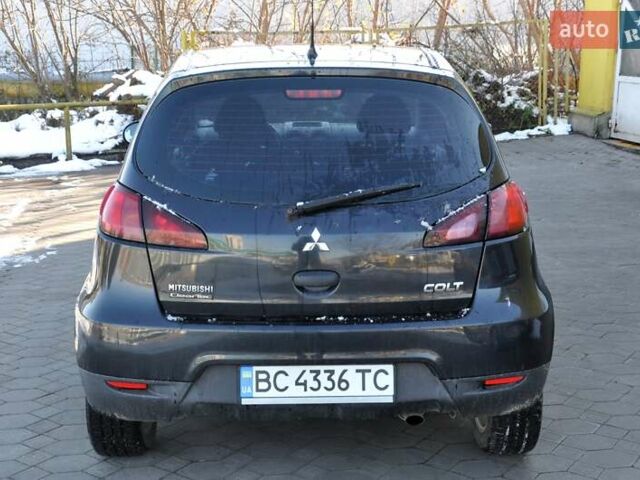 Черный Мицубиси Кольт, объемом двигателя 1.12 л и пробегом 251 тыс. км за 3800 $, фото 8 на Automoto.ua