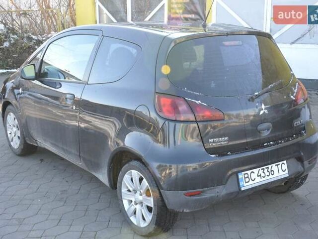 Черный Мицубиси Кольт, объемом двигателя 1.12 л и пробегом 251 тыс. км за 3800 $, фото 10 на Automoto.ua