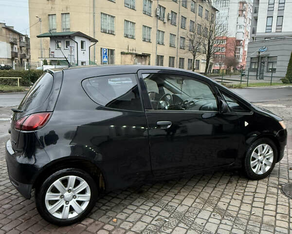 Черный Мицубиси Кольт, объемом двигателя 1.1 л и пробегом 250 тыс. км за 3700 $, фото 5 на Automoto.ua
