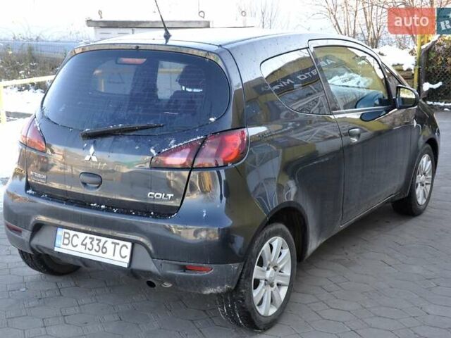 Черный Мицубиси Кольт, объемом двигателя 1.12 л и пробегом 251 тыс. км за 3800 $, фото 6 на Automoto.ua