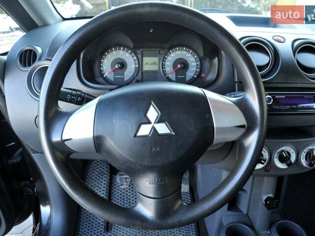 Черный Мицубиси Кольт, объемом двигателя 1.12 л и пробегом 251 тыс. км за 3800 $, фото 24 на Automoto.ua