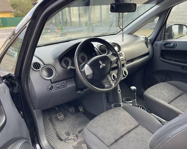 Черный Мицубиси Кольт, объемом двигателя 1.1 л и пробегом 240 тыс. км за 3450 $, фото 10 на Automoto.ua