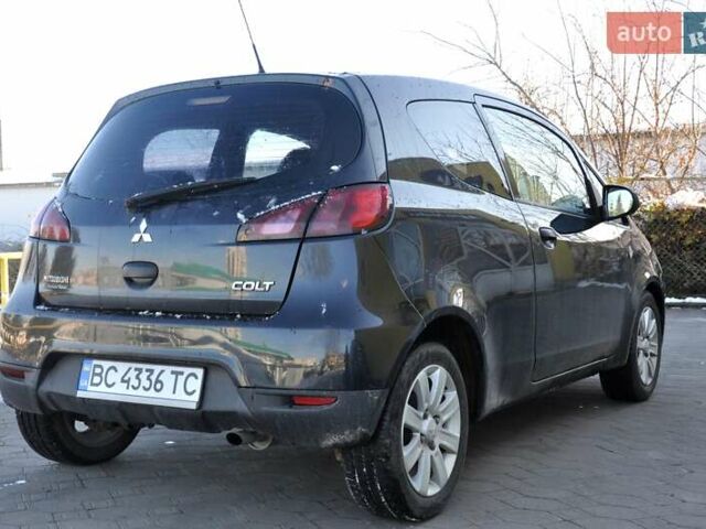 Черный Мицубиси Кольт, объемом двигателя 1.12 л и пробегом 251 тыс. км за 3800 $, фото 7 на Automoto.ua