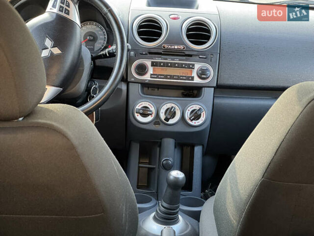 Чорний Міцубісі Кольт, об'ємом двигуна 1.3 л та пробігом 170 тис. км за 7100 $, фото 9 на Automoto.ua