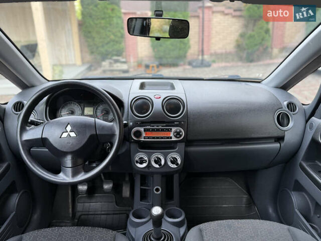 Черный Мицубиси Кольт, объемом двигателя 1.3 л и пробегом 173 тыс. км за 5800 $, фото 11 на Automoto.ua
