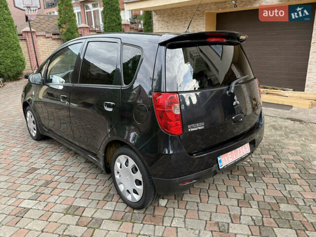 Черный Мицубиси Кольт, объемом двигателя 1.3 л и пробегом 173 тыс. км за 5800 $, фото 7 на Automoto.ua