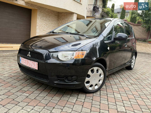 Черный Мицубиси Кольт, объемом двигателя 1.3 л и пробегом 173 тыс. км за 5800 $, фото 1 на Automoto.ua