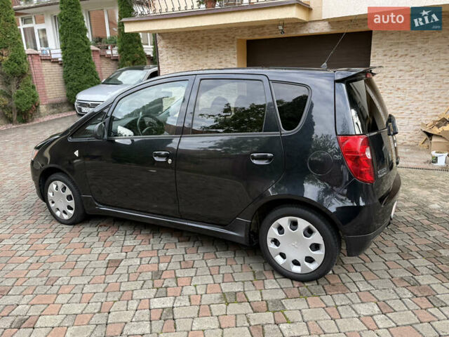 Черный Мицубиси Кольт, объемом двигателя 1.3 л и пробегом 173 тыс. км за 5800 $, фото 8 на Automoto.ua