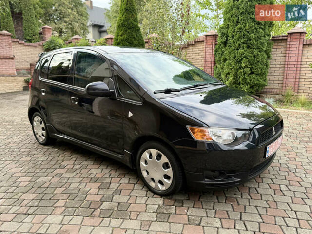 Черный Мицубиси Кольт, объемом двигателя 1.3 л и пробегом 173 тыс. км за 5800 $, фото 3 на Automoto.ua