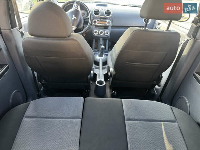 Чорний Міцубісі Кольт, об'ємом двигуна 1.3 л та пробігом 170 тис. км за 7100 $, фото 10 на Automoto.ua