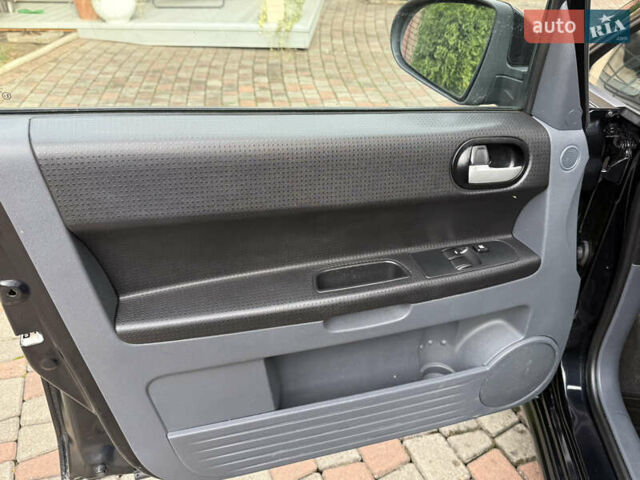 Черный Мицубиси Кольт, объемом двигателя 1.3 л и пробегом 173 тыс. км за 5800 $, фото 17 на Automoto.ua