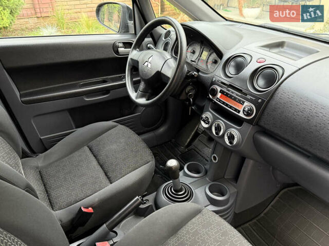 Черный Мицубиси Кольт, объемом двигателя 1.3 л и пробегом 173 тыс. км за 5800 $, фото 18 на Automoto.ua
