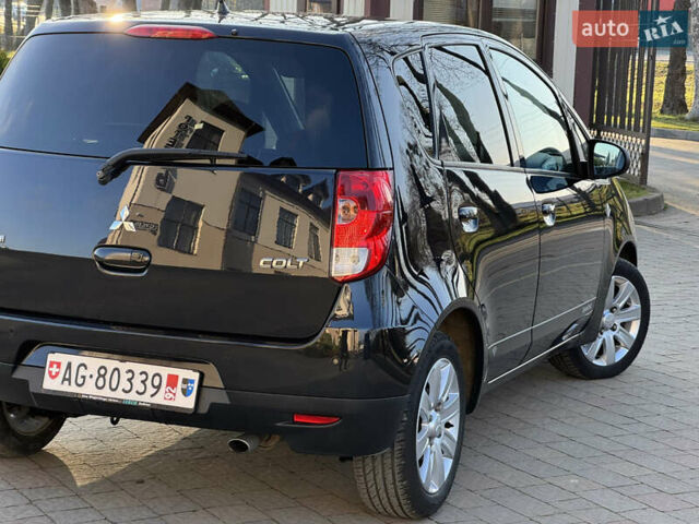 Чорний Міцубісі Кольт, об'ємом двигуна 1.3 л та пробігом 170 тис. км за 7100 $, фото 5 на Automoto.ua
