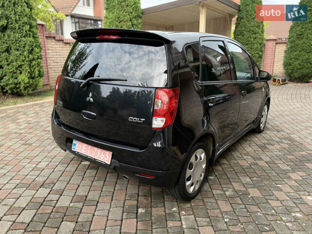 Черный Мицубиси Кольт, объемом двигателя 1.3 л и пробегом 173 тыс. км за 5800 $, фото 6 на Automoto.ua