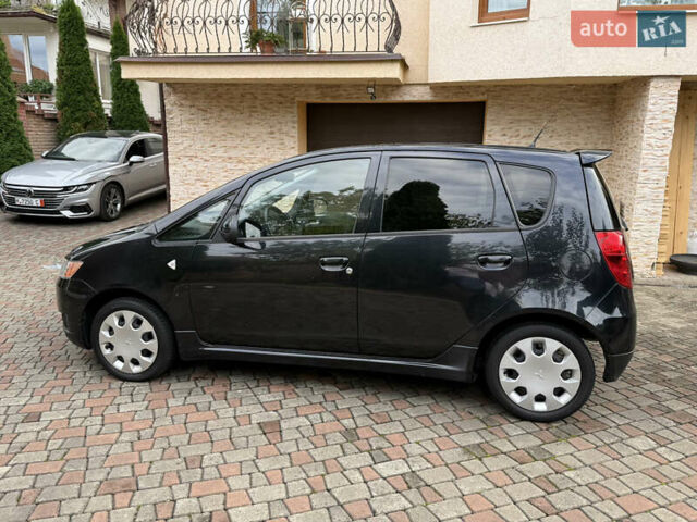 Черный Мицубиси Кольт, объемом двигателя 1.3 л и пробегом 173 тыс. км за 5800 $, фото 9 на Automoto.ua