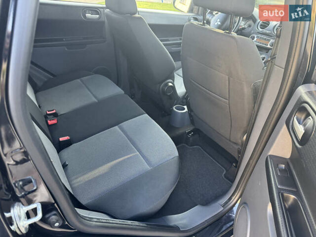 Чорний Міцубісі Кольт, об'ємом двигуна 1.3 л та пробігом 170 тис. км за 7100 $, фото 11 на Automoto.ua