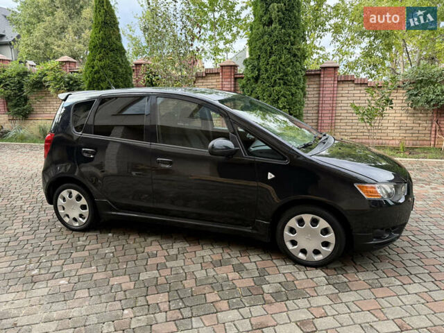 Черный Мицубиси Кольт, объемом двигателя 1.3 л и пробегом 173 тыс. км за 5800 $, фото 4 на Automoto.ua