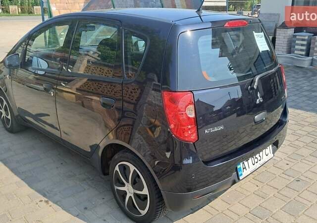 Чорний Міцубісі Кольт, об'ємом двигуна 1.3 л та пробігом 105 тис. км за 6800 $, фото 5 на Automoto.ua