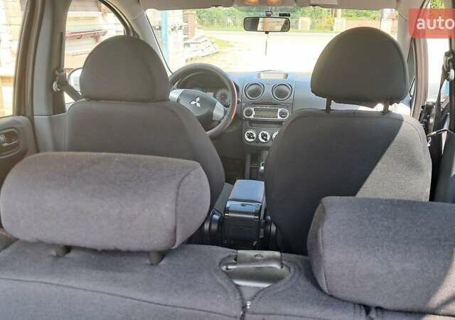 Чорний Міцубісі Кольт, об'ємом двигуна 1.3 л та пробігом 105 тис. км за 6800 $, фото 12 на Automoto.ua