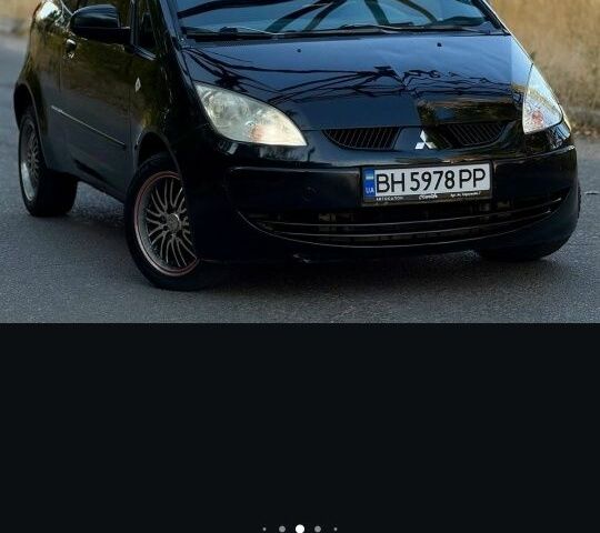 Черный Мицубиси Кольт, объемом двигателя 1.3 л и пробегом 166 тыс. км за 3500 $, фото 1 на Automoto.ua
