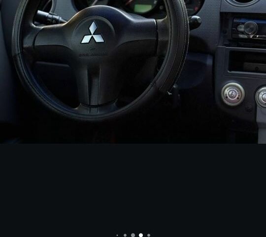 Черный Мицубиси Кольт, объемом двигателя 1.3 л и пробегом 166 тыс. км за 3500 $, фото 5 на Automoto.ua