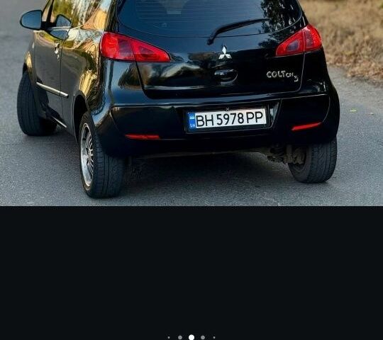 Черный Мицубиси Кольт, объемом двигателя 1.3 л и пробегом 166 тыс. км за 3500 $, фото 3 на Automoto.ua