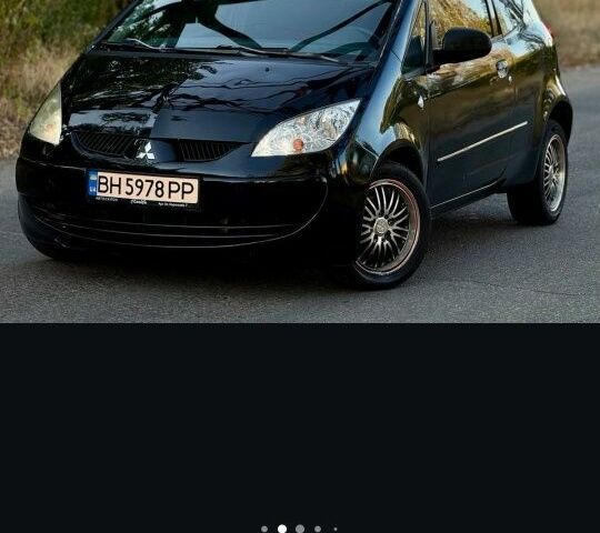 Черный Мицубиси Кольт, объемом двигателя 1.3 л и пробегом 166 тыс. км за 3500 $, фото 2 на Automoto.ua