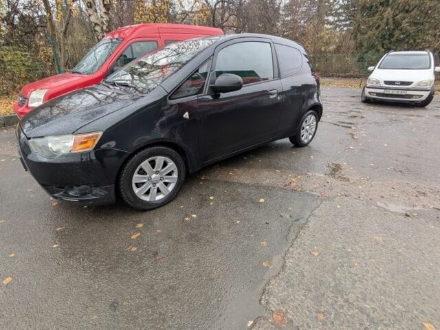 Черный Мицубиси Кольт, объемом двигателя 1.1 л и пробегом 250 тыс. км за 4100 $, фото 1 на Automoto.ua