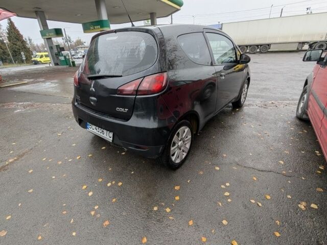 Черный Мицубиси Кольт, объемом двигателя 1.1 л и пробегом 250 тыс. км за 4100 $, фото 6 на Automoto.ua