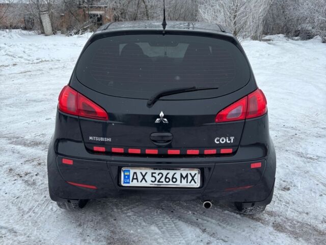 Чорний Міцубісі Кольт, об'ємом двигуна 1.3 л та пробігом 3 тис. км за 4000 $, фото 4 на Automoto.ua