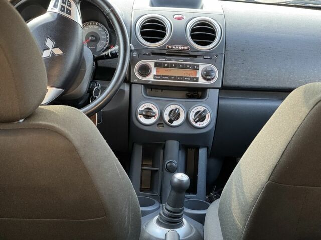 Черный Мицубиси Кольт, объемом двигателя 1.3 л и пробегом 170 тыс. км за 7100 $, фото 7 на Automoto.ua