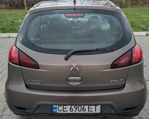 Коричневый Мицубиси Кольт, объемом двигателя 1.33 л и пробегом 110 тыс. км за 6800 $, фото 9 на Automoto.ua