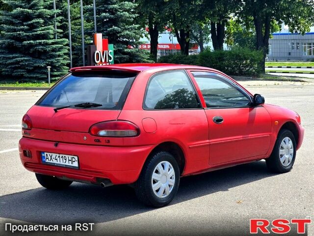 Красный Мицубиси Кольт, объемом двигателя 1.3 л и пробегом 102 тыс. км за 1300 $, фото 2 на Automoto.ua