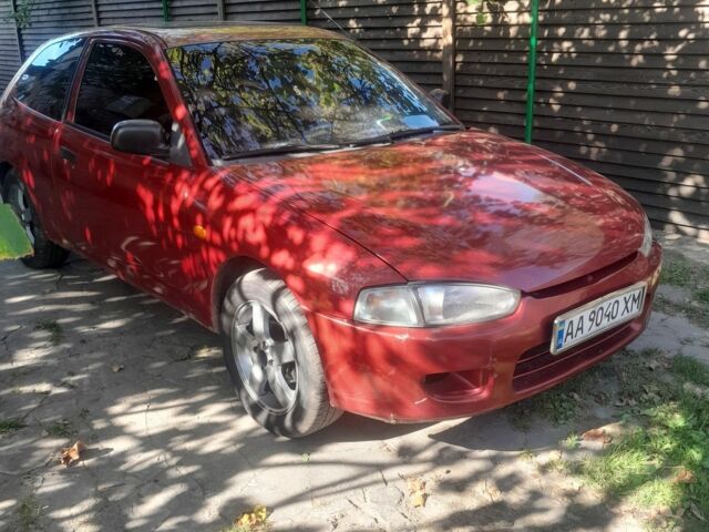 Червоний Міцубісі Кольт, об'ємом двигуна 1.3 л та пробігом 200 тис. км за 1500 $, фото 1 на Automoto.ua
