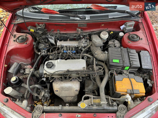 Красный Мицубиси Кольт, объемом двигателя 1.3 л и пробегом 210 тыс. км за 2500 $, фото 8 на Automoto.ua