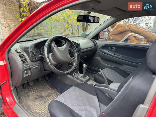 Красный Мицубиси Кольт, объемом двигателя 1.3 л и пробегом 210 тыс. км за 2500 $, фото 5 на Automoto.ua