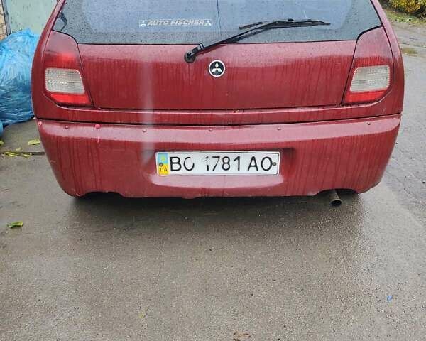 Красный Мицубиси Кольт, объемом двигателя 1.3 л и пробегом 200 тыс. км за 1300 $, фото 4 на Automoto.ua