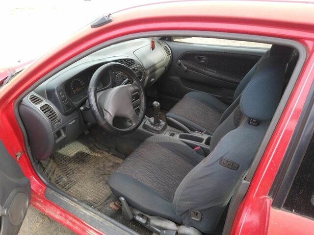 Червоний Міцубісі Кольт, об'ємом двигуна 1.3 л та пробігом 76 тис. км за 358 $, фото 6 на Automoto.ua