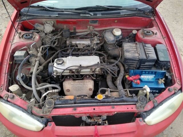 Червоний Міцубісі Кольт, об'ємом двигуна 1.3 л та пробігом 76 тис. км за 358 $, фото 5 на Automoto.ua