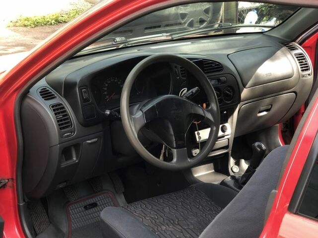 Міцубісі Кольт 2000 у Одесі на Automoto.ua Червоний Міцубісі Кольт, об'ємом двигуна 1.3 л та пробігом 1000 тис. км за 2100 $, фото 8 на Automoto.ua